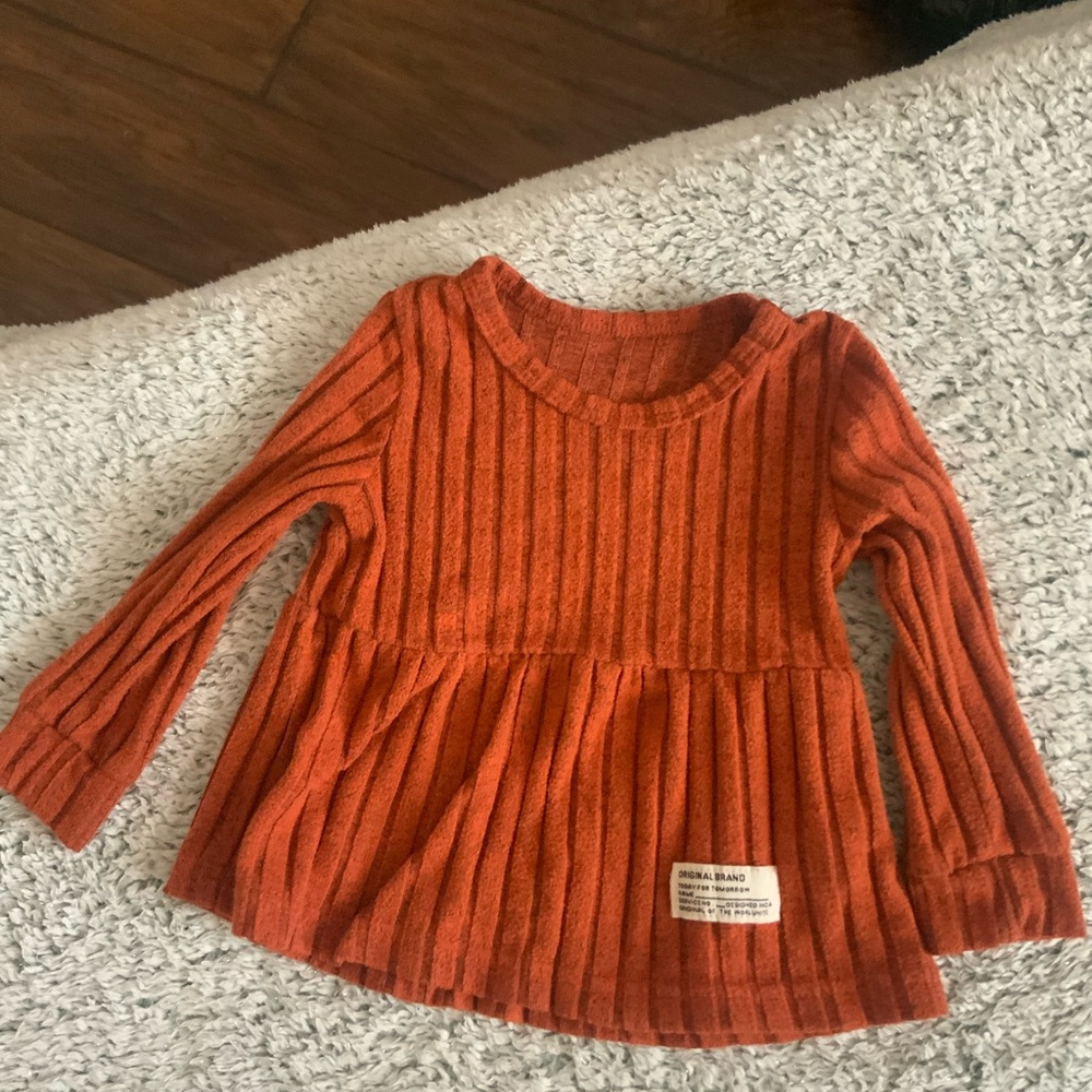 Orange Ribbed Peplum Sweater Top